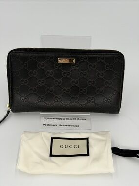 Gucci Black GG Embossed Zip-Around Organizer Wallet Good Condition